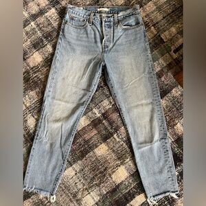 Levi’s light wash Wedgie Jeans with raw hem size 28